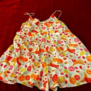 Romper with fun summer pattern and roomy side inside pockets.